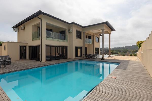 Welcome to this exquisite 4-bedroom luxury holiday house located in the sought-after Sheffield Beach, Ballito. This property offers a ...