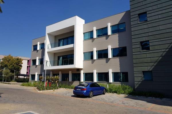 This brand new premium grade office building is located just off Corlett Drive off-ramp ...