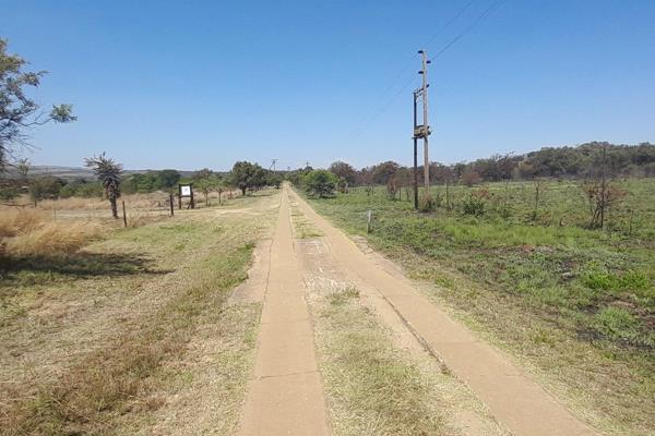 This 21 acre smallholding is undeveloped, except for a strong borehole.  The corner ...