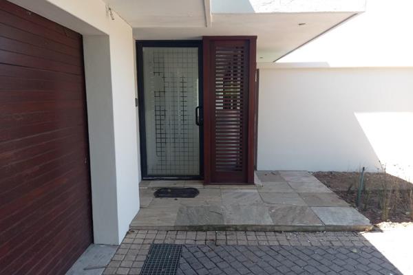 This attractive property within the Nkwazi Ridge Estate offers an open-plan living area ...