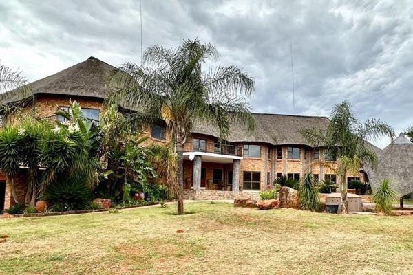 Nestled amidst the verdant embrace of nature, this magnificent 9-bedroom thatch lodge beckons with the promise of unforgettable ...