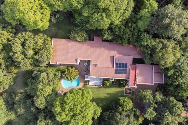 A stunning property in Ninapark within a prestigious security estate, showcasing the beautiful Magaliesburg Mountain. The house ...