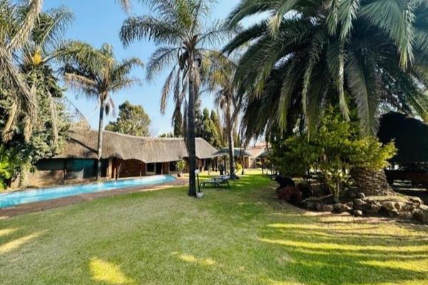 This remarkable property offers an exceptional opportunity to acquire not only a guesthouse but also an adjacent vacant land spanning a ...