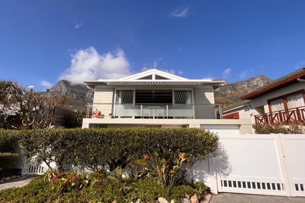 A two-storey bungalow beach house situated one road back from Bakoven Beach with views ...