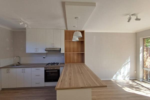 This home offers a newly designed kitchen, equipped with a build-in gas hob and ...