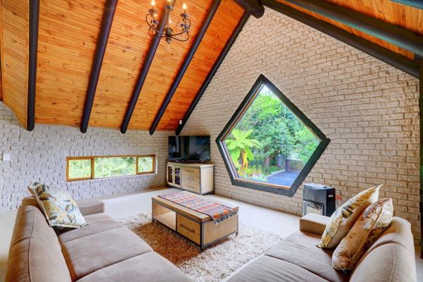 This magnificent three level/5-bedroom home is situated in nature with the Kat River ...