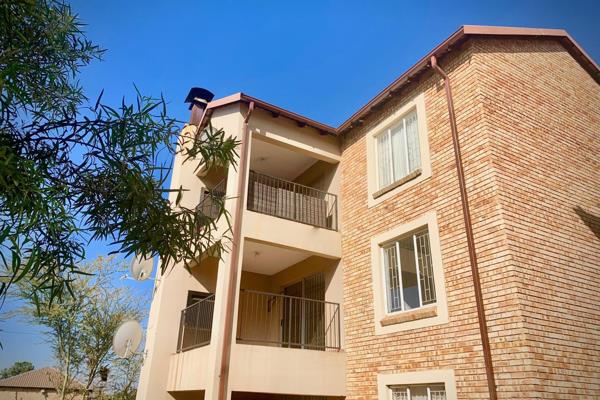 The open-plan modern kitchen offers space for a double door fridge and leads through to the lounge area. The bedrooms are well-sized ...