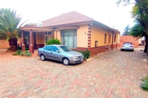 The incredible twelve-bedroom house is situated in the quiet suburb of Delville Germiston. The house is fully tiled consisting of neat ...