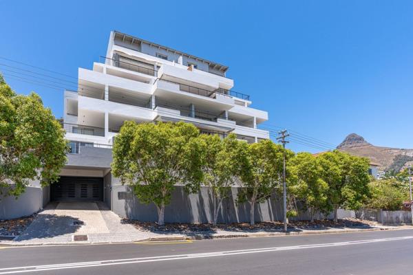 This exquisite duplex penthouse boasts uninterrupted panoramic views of the sea and mountain. 

Open plan kitchen, dining area, lounge, and bar area all flow to balconies with stacking doors, providing a seamless indoor/outdoor living experience.

It features expansive ...