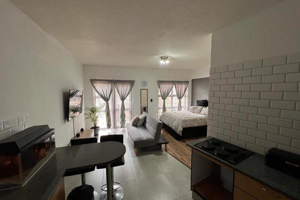 Step into this secure, 3rd floor newly renovated, cozy modern studio apartment which has ...