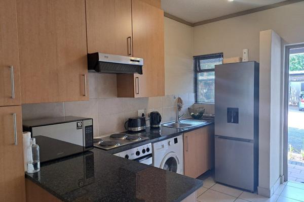 This elegant bachelor, bathroom (shower only) garden apartment in Sunninghill - one of ...