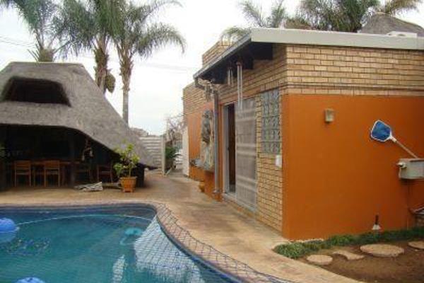 If you are looking for a spacious three bedroom, two bathroom house with a big thatch lapa and pool this is the property for you.

It ...