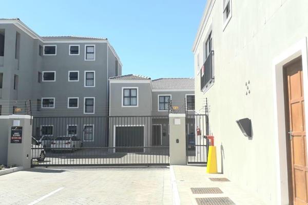 Spacious 3 Bedroom Duplex Townhouse with garage and parking bay.

This brand new ...