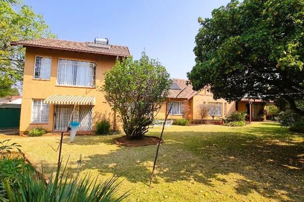 This  Family home fronts to the North.  When you enter from the street you can go via the remote gate that open into two carports with ...