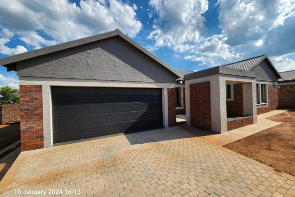 Spacious stand alone house with open plan living room and kitchen
Electric double garage
Totally fenced with electric gate