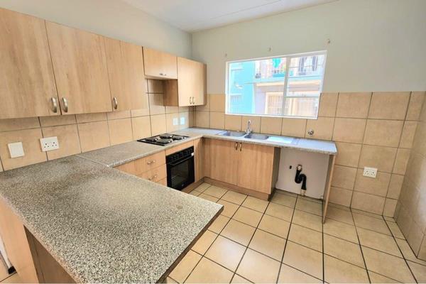 Light  bright ground floor apartment with open plan kitchen, tiled dining  living area leading to a patio  braai area. 2 Bedrooms and 1 ...