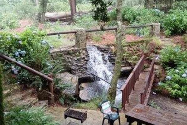 Nestled atop the picturesque Hogsback, this charming 3.9-ha property offers a haven for its residents. The enchanting garden ...