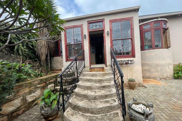 This charming residence exudes warmth and elegance. With 3 bedrooms, 1 full bathroom ...