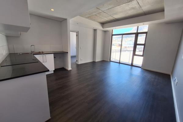 Sleek and modern one bedroom with amazing views onto Devils peak.
Awesome kitchen ...