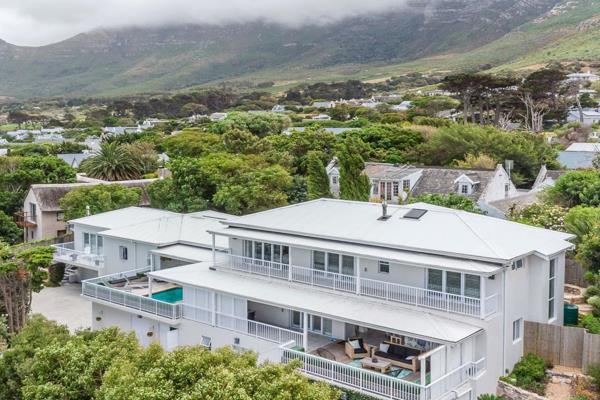 Welcome to a captivating dual-living haven in the heart of Noordhoek, where breathtaking ocean and mountain views meet luxurious ...