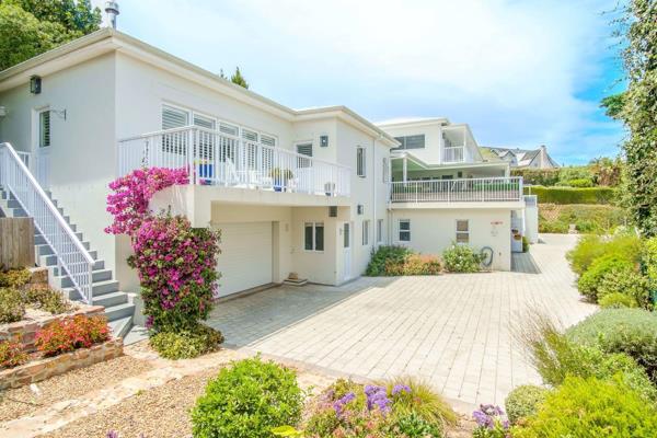 Welcome to a captivating dual-living haven in the heart of Noordhoek, where breathtaking ocean and mountain views meet luxurious ...