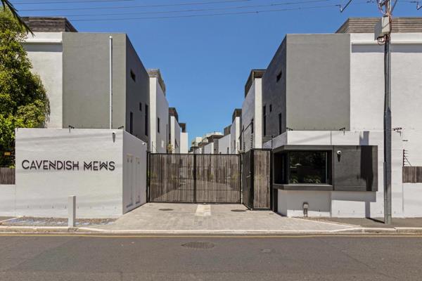 This luxurious townhouse stands as a beacon of modern living, nestled in the esteemed ...