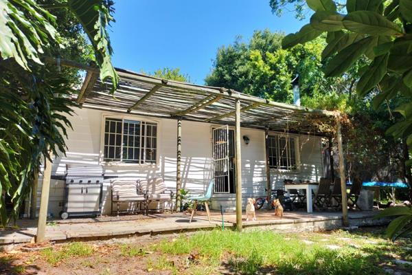 Nestled under mature trees, this two bedroom cottage has it&#39;s own entrance, a good sized garden, and off street parking for two ...