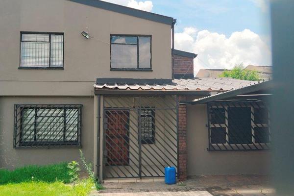 Situated a stone&#39;s throw from Ahmed Kathrada Hospital, this property offers an enticing opportunity for investors. 

You could opt ...