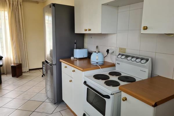 This apartment is situated on the first floor.  
It has a gully style kitchen with ...