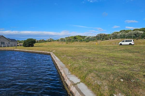 Unlock the door to your dream waterfront lifestyle with this pristine piece of land in the prestigious Marina Martinique. Nestled along ...