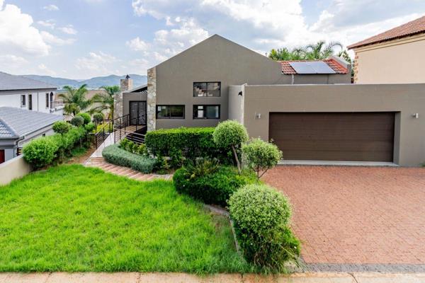 This lovely modern home in Kosmos Ridge is a unique find.  You can enter the house via the patio with a braai and sliding doors or via ...