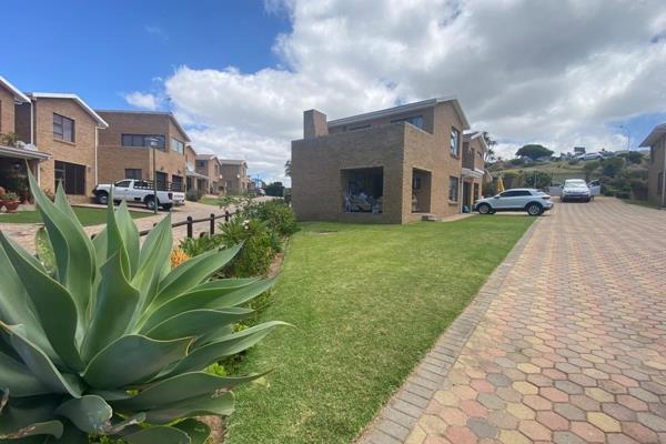 Perfect  lock-up  and go.

This double story face brick townhouse. Very popular complex in Hartenbos. Open plan living area with ...