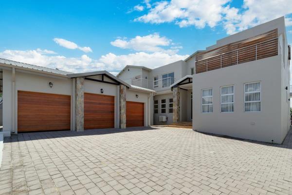 Phenomenally renovated family home in the much sought-after Helderfontein Estate. This 5-bedroom home features spacious living rooms ...