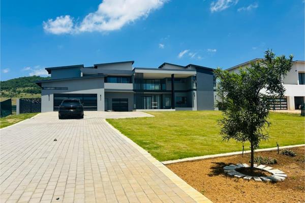 This magnificent ultra-modern home is situated on a spacious 1016 square meter stand. It boasts luxury amenities including a Marmelite ...