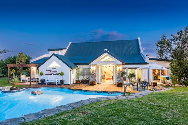 Discover a slice of paradise in Stilbaai&#39;s Riverside Security Estate, where a ...