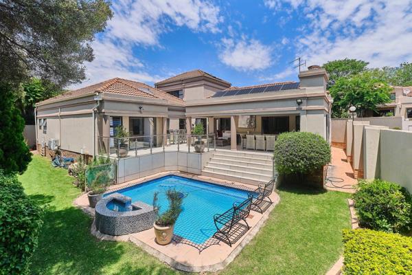 Nestling in a boomed tree lined cul de sac  in a totally secure development, this home exudes impeccable style and undisputable ...