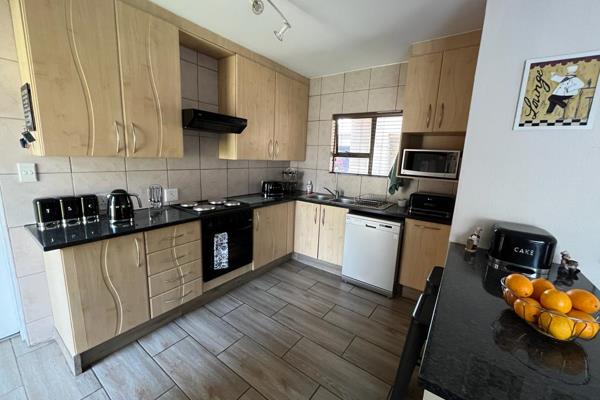 This modern unit offers the following features:
3 bedrooms with tiled floors
1 full main en suite bathroom - upstairs
1 bathroom ...