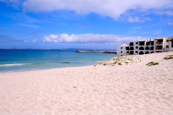 A unique opportunity to invest and develop this prime beach front property in Langebaan ...