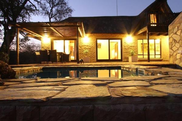 Packed with style that will impress and exuding warmth for comfortable bushveld living. This Lodge is well located within the popular ...