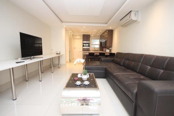 Contemporary 2-bed, 2 bath apartment featuring sleek design, open-concept living spaces ...