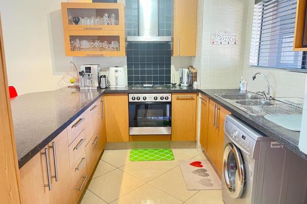 Welcome to this charming ground floor apartment nestled in a serene complex, offering ...