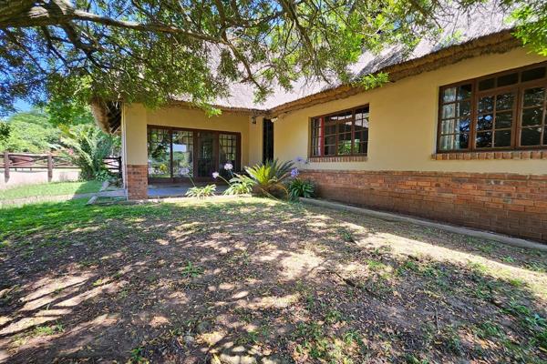 This beautifully established property sits on a vast 1.2-hectare piece of land and features a private dam, complete with a jetty, lapa ...