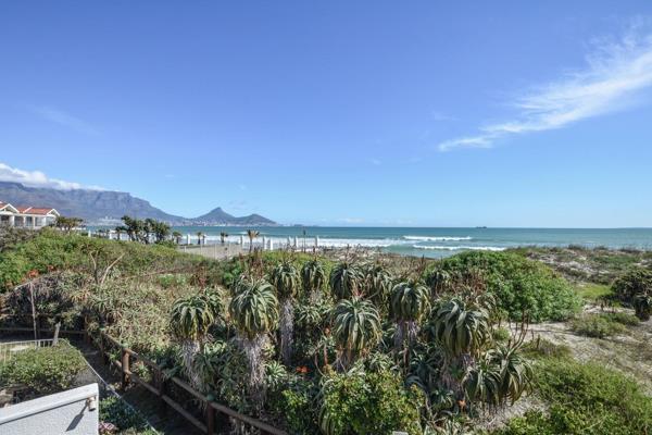 This is a golden opportunity to own a property that offers exceptional views and direct access to the beach.
The living area of this ...