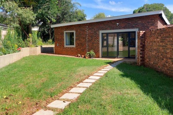 This newly renovated open plan Scandinavian inspired house with double doors that open ...