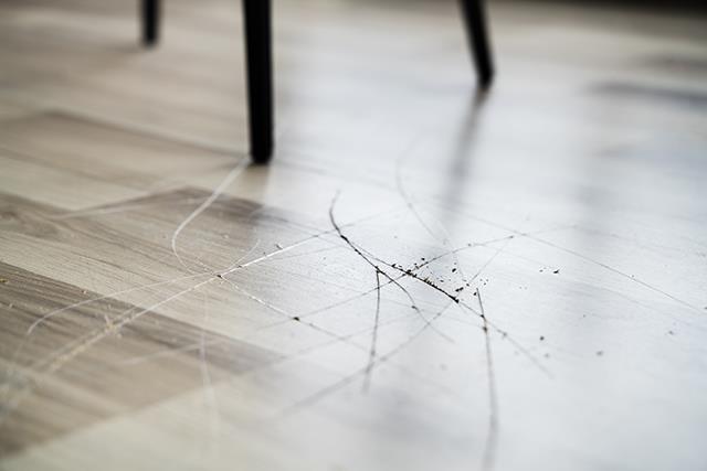 Tips for concealing scratches and scuff marks on laminate flooring ...