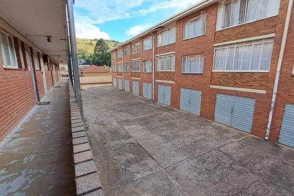 Spacious first floor apartment in a secure complex in Pretoria Gardens with remote ...