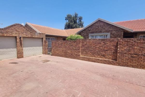 Neat three bedroom fully tiled duplex townhouse | small garden | two bathrooms | single ...