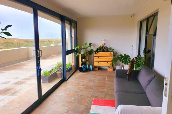 Sunrise Beach is located across the street, walk straight onto the beach. Perfect lock up and go Cape Town beach lifestyle.

Watch the sunrise over the beautiful sea views from your enclosed balcony.

You can see the waves ...