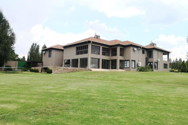 This modern one owner mansion is situated on the banks of the Zuikerbos river in a safe and secure estate and offers all you need and ...