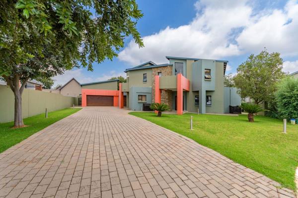 This coveted contemporary home will accommodate the most discerning family. Upon ...